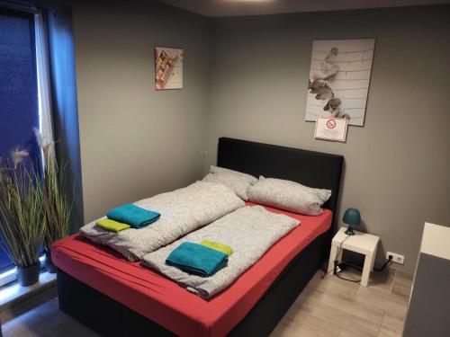 Postel nebo postele na pokoji v ubytování Flensburg City - 24h