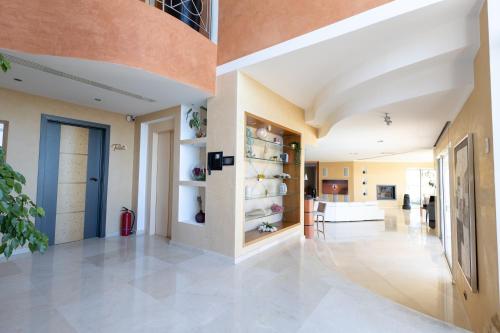a hallway of a house with a living room at Villa The View in Villefranche-sur-Mer