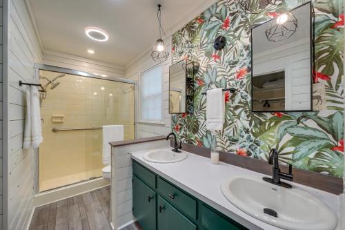 a bathroom with two sinks and a shower at Wilmington Rental about 4 Mi to Wrightsville Beach! in Wilmington