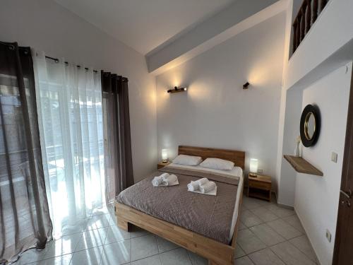 Katil atau katil-katil dalam bilik di Bella Maisonette
