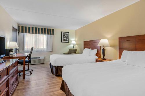 Ένα ή περισσότερα κρεβάτια σε δωμάτιο στο Best Western Plus Augusta Civic Center Inn