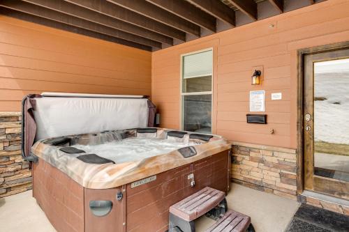 a small room with a bed and a window at Spacious Home with Mtn View Less Than 6 Mi to Park City! in Heber City