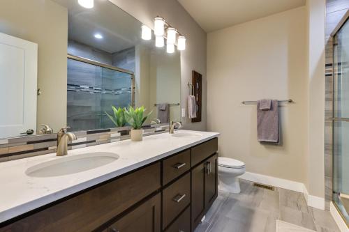 a bathroom with a sink and a toilet at Fraser Vacation Rental - Shuttle to Winter Park! in Fraser