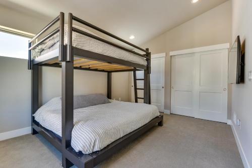 a bedroom with a bunk bed and a closet at Fraser Vacation Rental - Shuttle to Winter Park! in Fraser