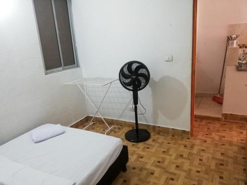 Ένα ή περισσότερα κρεβάτια σε δωμάτιο στο Apartamento Barbie 3