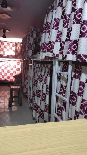 a store with a bunch of ties on display at Indian Drom Hostel-PG in Mumbai