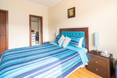 Postel nebo postele na pokoji v ubytování Hermosa Suite, siéntete en casa!