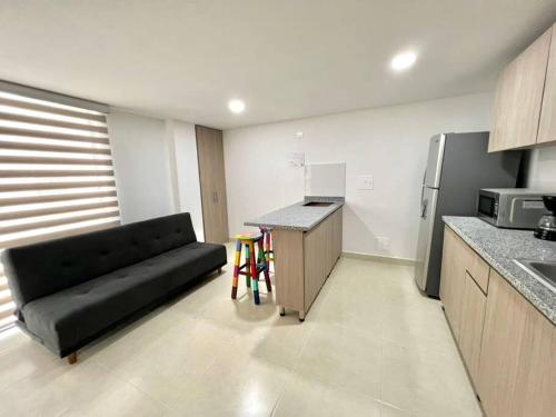 Kuchyň nebo kuchyňský kout v ubytování Bonito apartaestudio /manizales