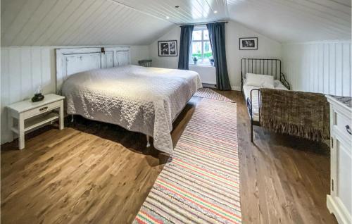 Ένα ή περισσότερα κρεβάτια σε δωμάτιο στο Beautiful Home In Hestra With Wifi