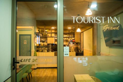 Φωτογραφία από το άλμπουμ του Tourist Inn Grand στο Μαλέ