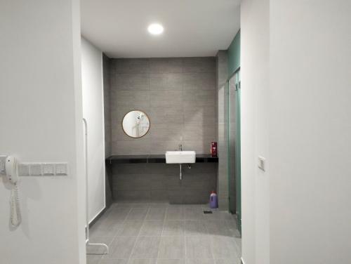 a bathroom with a sink and a mirror at The Pano Jalan Ipoh Sentul by Kenangan Homes in Kuala Lumpur