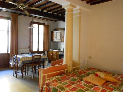Ένα ή περισσότερα κρεβάτια σε δωμάτιο στο Residence Domus