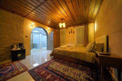 Goreme Cave Rooms&Poolにあるベッド