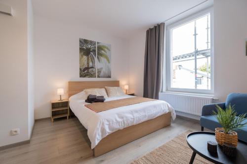 Кровать или кровати в номере Studio chic proche aéroport & centre-ville