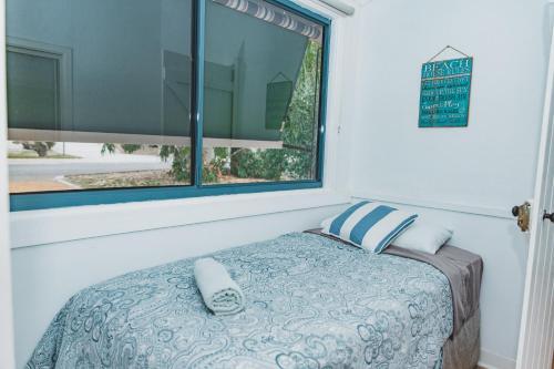 Postel nebo postele na pokoji v ubytování Dongara Hotel Motel