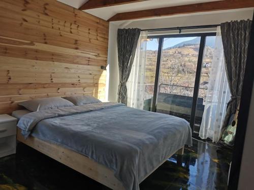 Postel nebo postele na pokoji v ubytování Cozy Cabin Bran