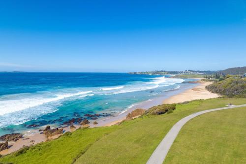 a view of the ocean and a beach at 1 15 Dalmeny Drive Kianga in Kianga