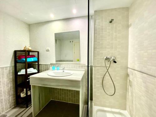 a bathroom with a sink and a shower at Apartment Alcaidesa in La Alcaidesa