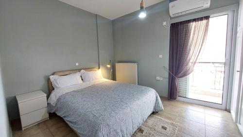 Ένα ή περισσότερα κρεβάτια σε δωμάτιο στο Vicky's place