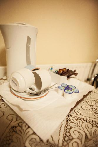 a pair of headphones sitting on top of a bed at The Derg Arms B&B in Castlederg