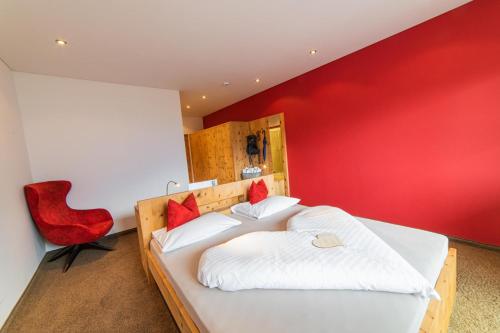 Katil atau katil-katil dalam bilik di Panorama Hotel Himmelreich