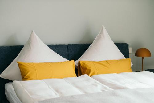 Letto o letti in una camera di Moselhaus by Clüsserath-Wittmann