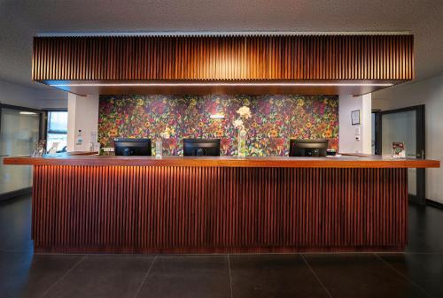 O saguão ou recepção de Hotel Cult Frankfurt City