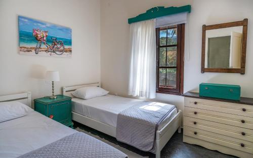Postel nebo postele na pokoji v ubytování Carissa house in Crete