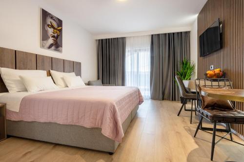 Postel nebo postele na pokoji v ubytování Villa Golden