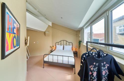 Un ou plusieurs lits dans un hébergement de l'établissement Design Hostel One