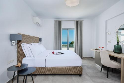 Ένα ή περισσότερα κρεβάτια σε δωμάτιο στο Quattro Suites