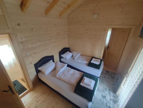 an overhead view of a bedroom in a tiny house at Vila Helena in Kolašin