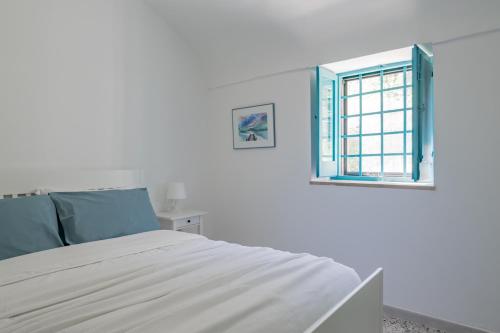 Ένα ή περισσότερα κρεβάτια σε δωμάτιο στο La casa di Maria - YourPlace Abruzzo