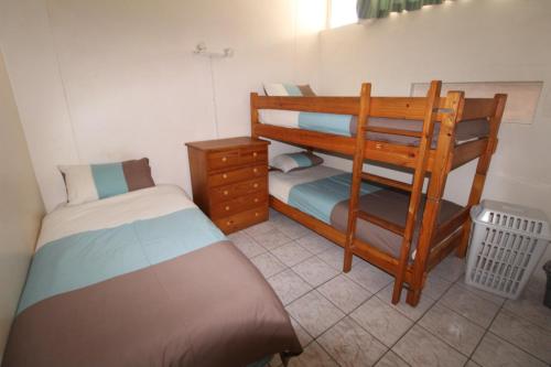 Postel nebo postele na pokoji v ubytování Seagull 403