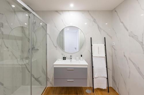 Et badeværelse på Pestana Apartments - Premium