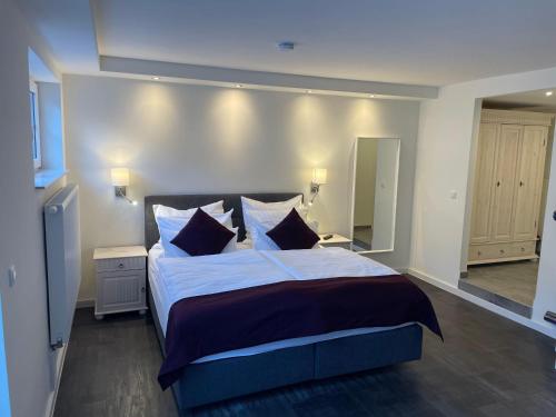 מיטה או מיטות בחדר ב-Seaside-Amrum-2 Souterrain-Wohnung