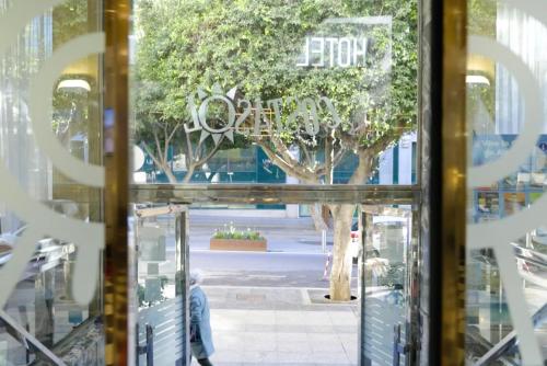 a view through the window of a store at Hotel Costasol in Almería