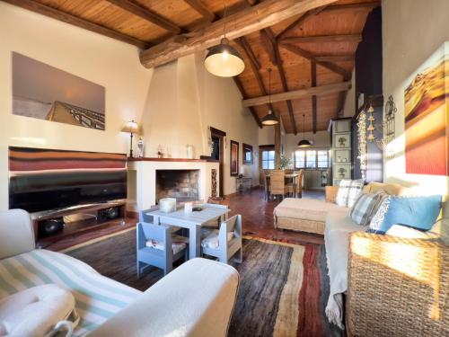 a living room with a couch and a fireplace at Mira Mar 8 in Swakopmund