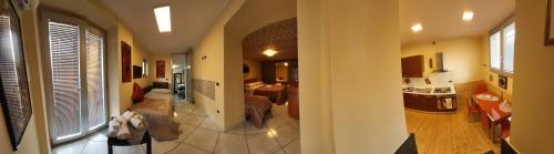a hallway with a living room and a living room at ArcHome in Pompei