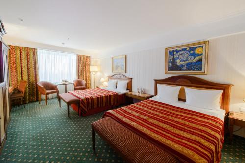 Cama o camas de una habitación en Hotel Korston Royal Kazan