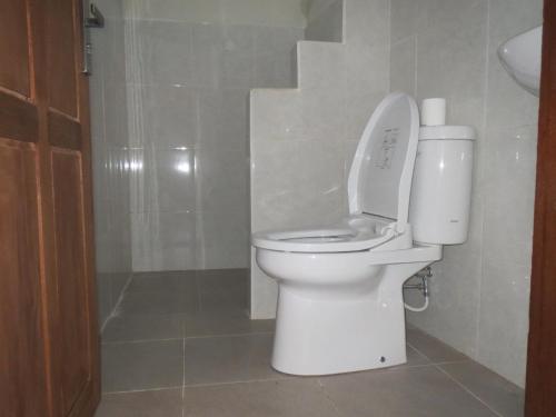 Ванная комната в Mesari Homestay & Warung
