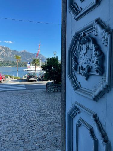 a blue door on the side of a building at BELLE ILE PARK in Griante Cadenabbia