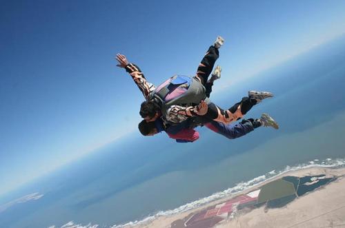 a man is doing a flip in the air at The Timeless Way Self Catering Accommodation in Swakopmund