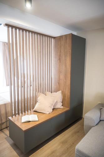 Ένα ή περισσότερα κρεβάτια σε δωμάτιο στο BEST APARTMENTS