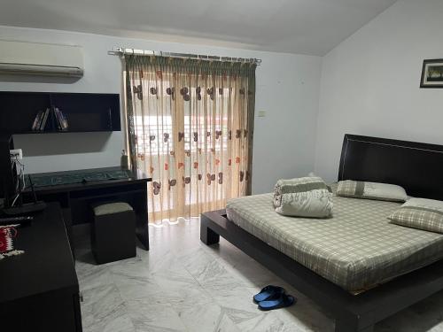 Una televisión o centro de entretenimiento en ET Apartaments