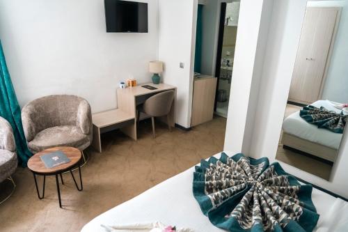 TV a/nebo společenská místnost v ubytování Hotel Nina