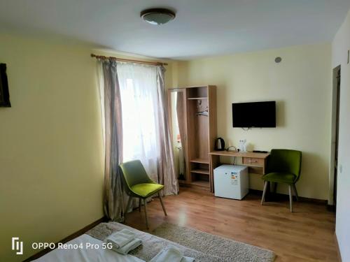 TV a/nebo společenská místnost v ubytování Casa Aurelia
