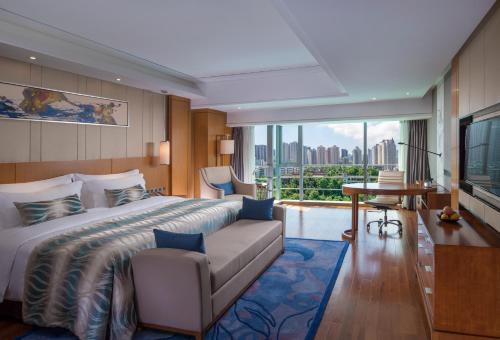 Postel nebo postele na pokoji v ubytování Sentosa Hotel Apartment Taoyuan Branch