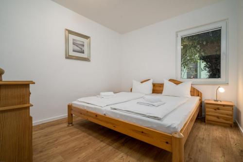 Ένα ή περισσότερα κρεβάτια σε δωμάτιο στο Ferienhaus Sternchen 3