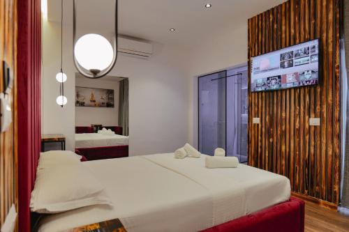 Кровать или кровати в номере Hotel Piramida